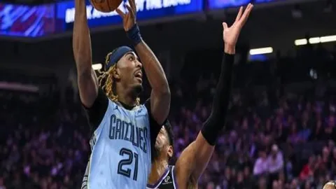 萨拉赫梅开二度，利物浦力克曼城夺冠